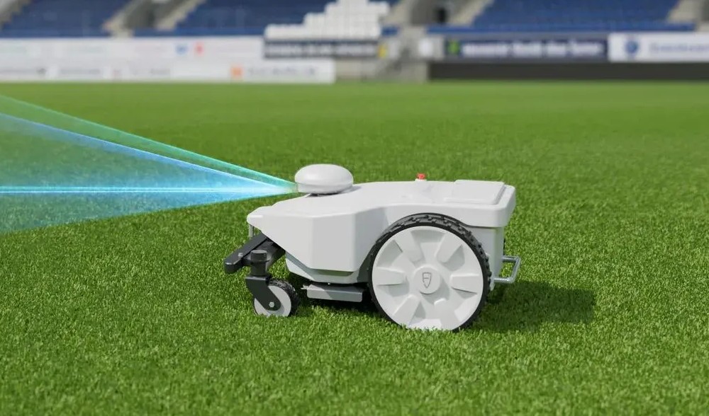 FJD FRX autonomous mower on turf